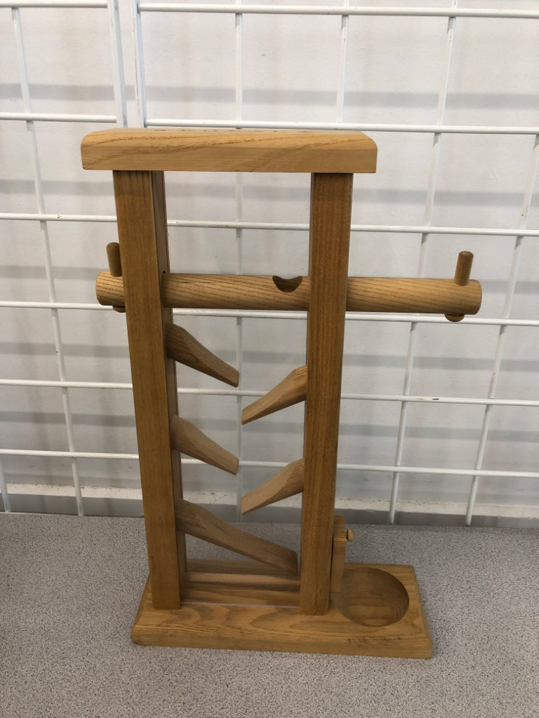 WOODEN ZIG-ZAG RAMP CANDY DISPENSER.