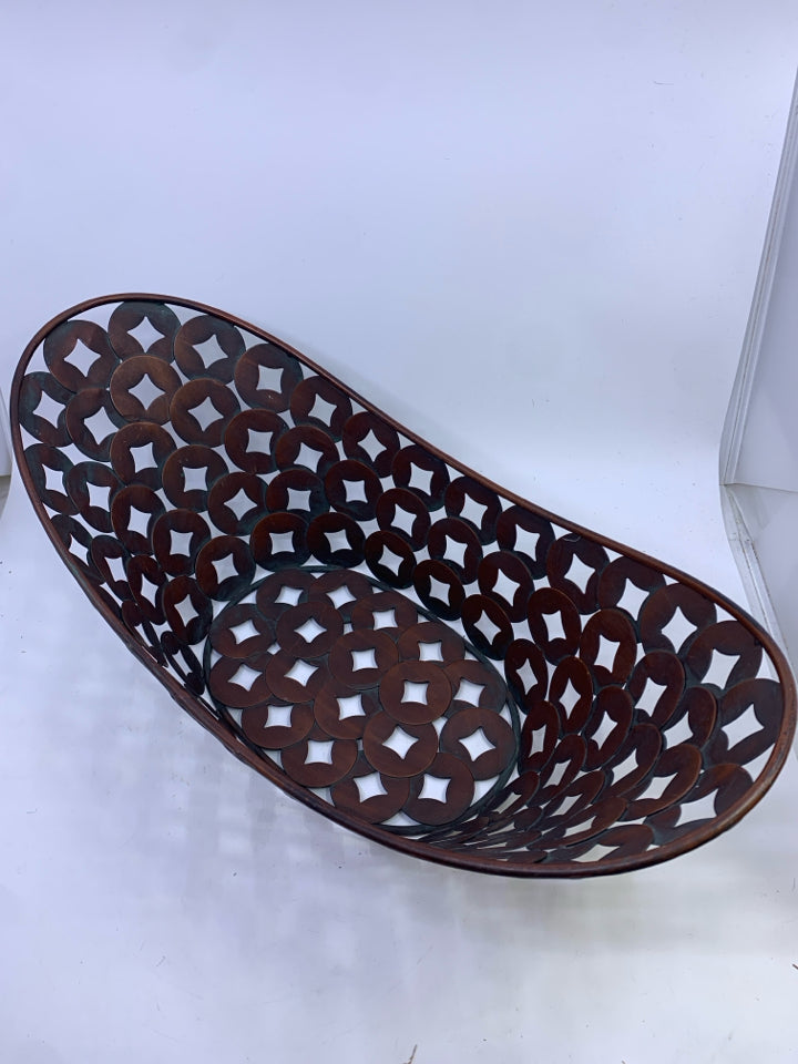 BROWN METAL CUTOUT BASKET.