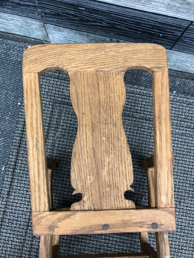 WOOD DOLL ROCKING CHAIR W/CANE SEAT.