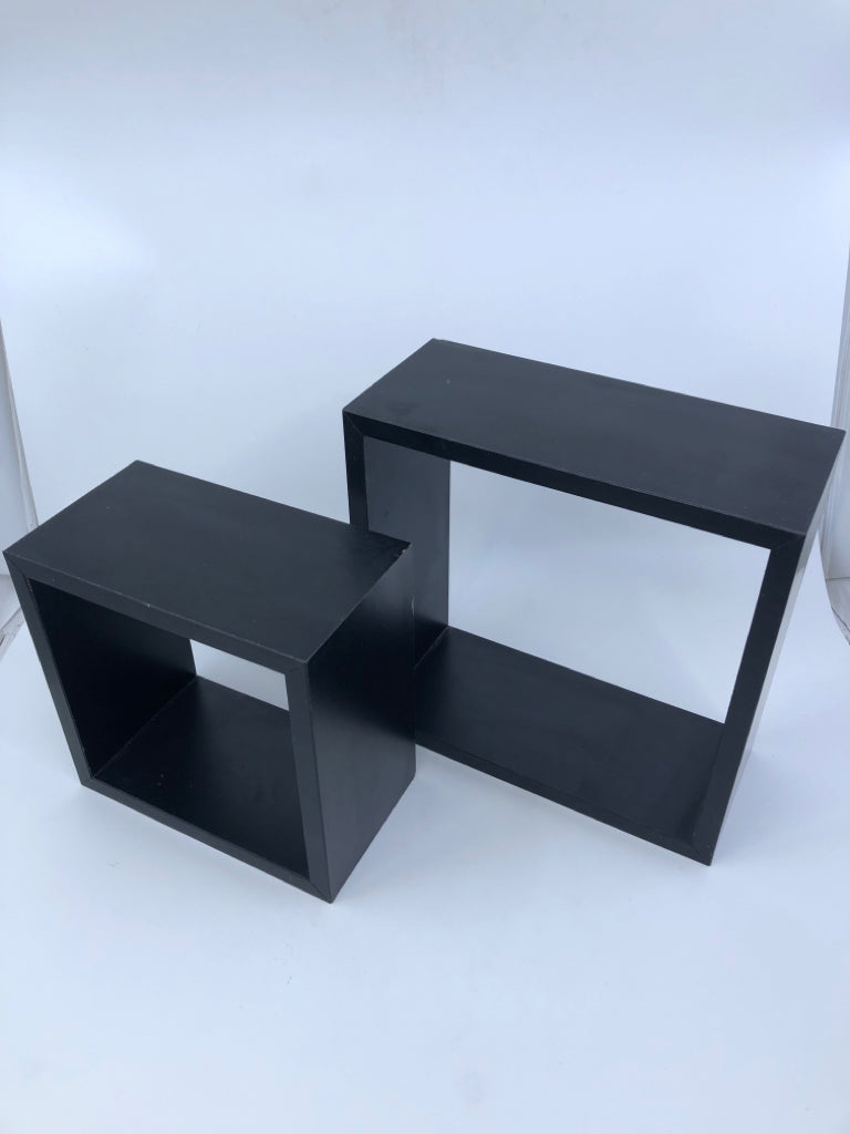 2 BLACK WALL HANGING CUBES.