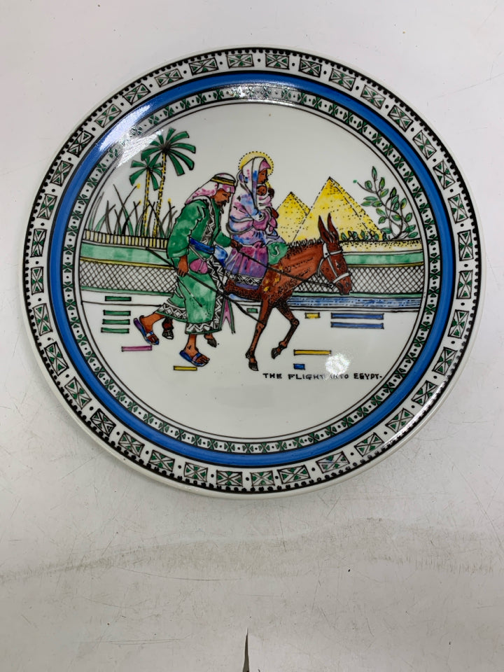 VTG FAMILY ON DONKEY PAITNED DECORATIVE PLATE.