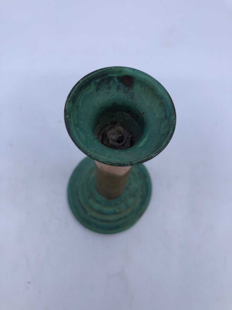 3 COPPER CANDLE HOLDERS W CANDLES.