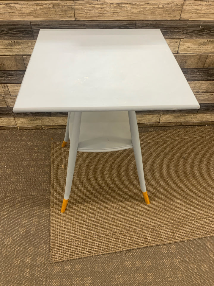 LIGHT BLUE PAINTED TABLE GOLD FEET.