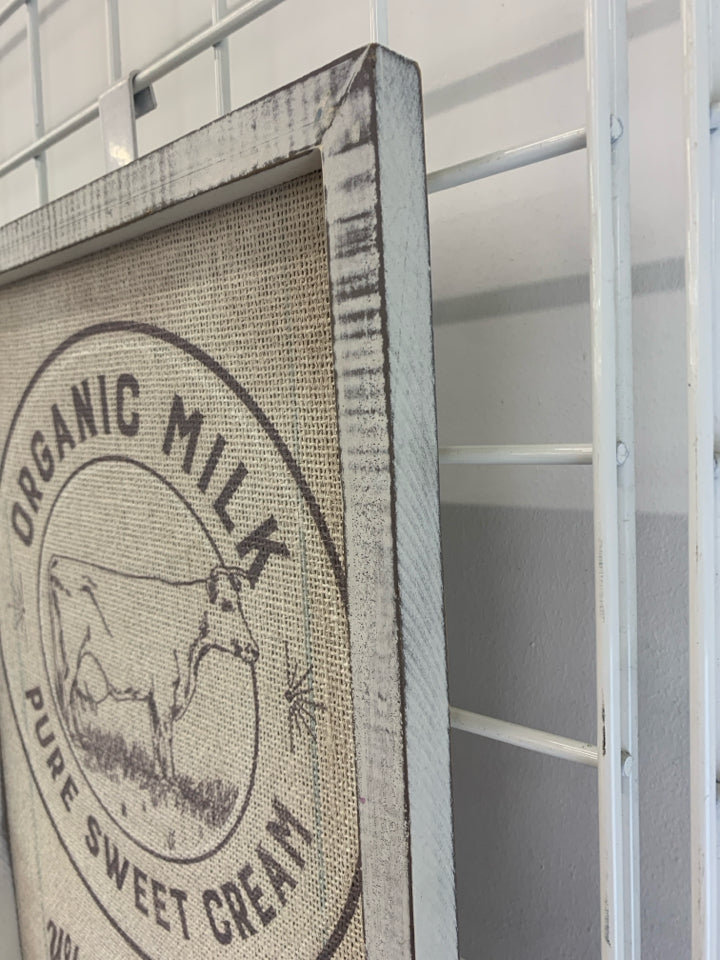 ORGANIC MILK BURLAP IN WHITE WASHED WALL HANGING.