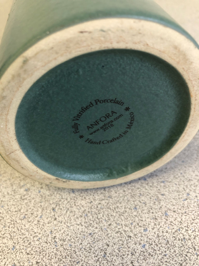 GREEN PORCELAIN BOTTLE WITH CORK.