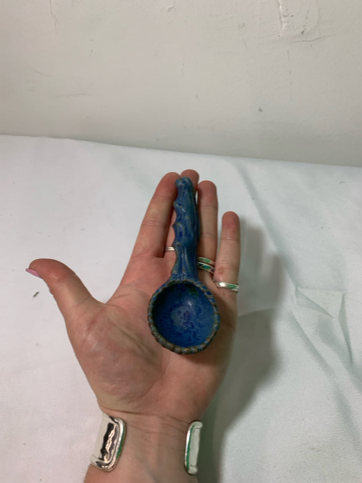 BLUE POTTERY CARVED SPOON.