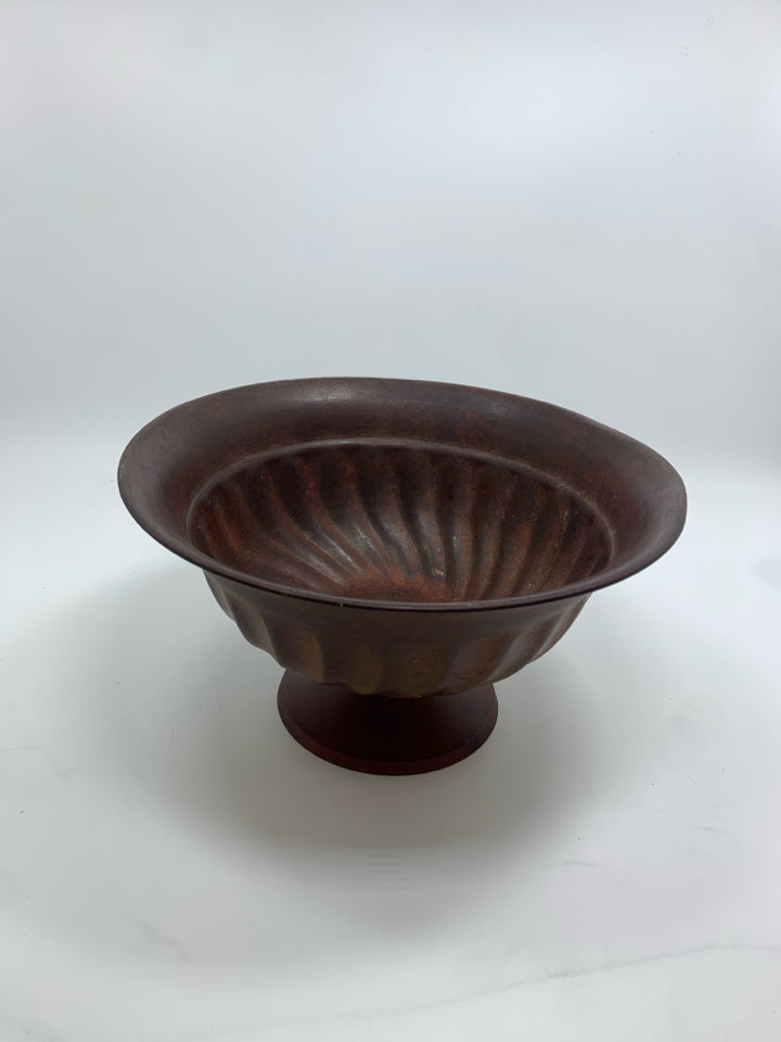 RED METAL FOOTED PLANTER.