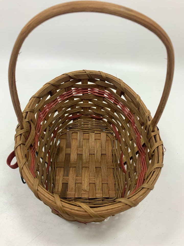 OVAL BASKET W/PINK STRIPES AND METAL APPLES.
