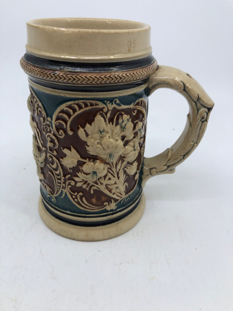 VTG EMBOSSED BOY AND GIRL DANCING STEIN.