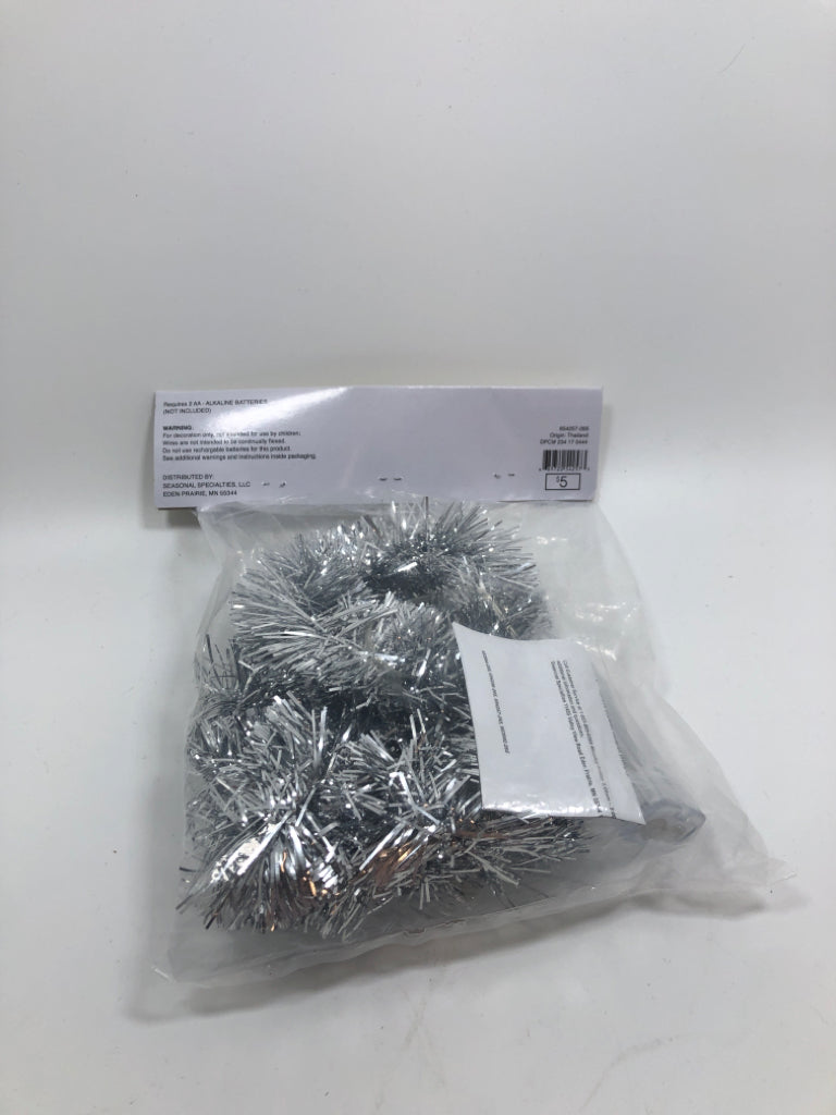 NIP SILVER TINSEL GARLAND W/ LED LIGHTS.