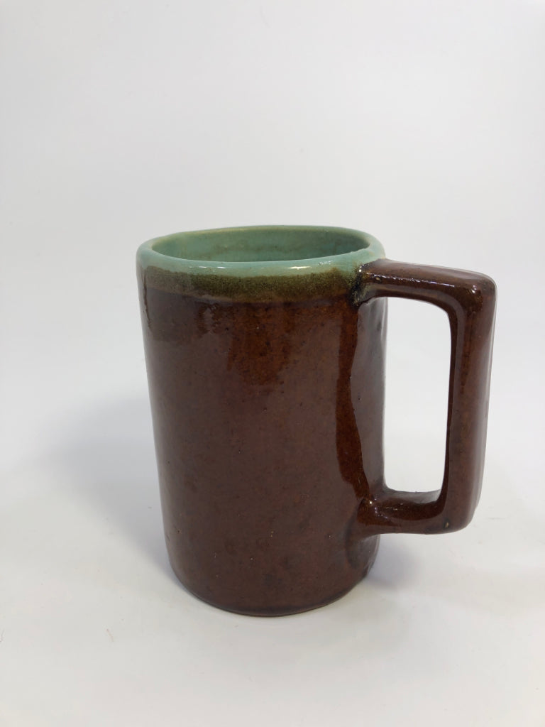 BROWN & BLUE POTTERY MUG W/SQUARE HANDLE.
