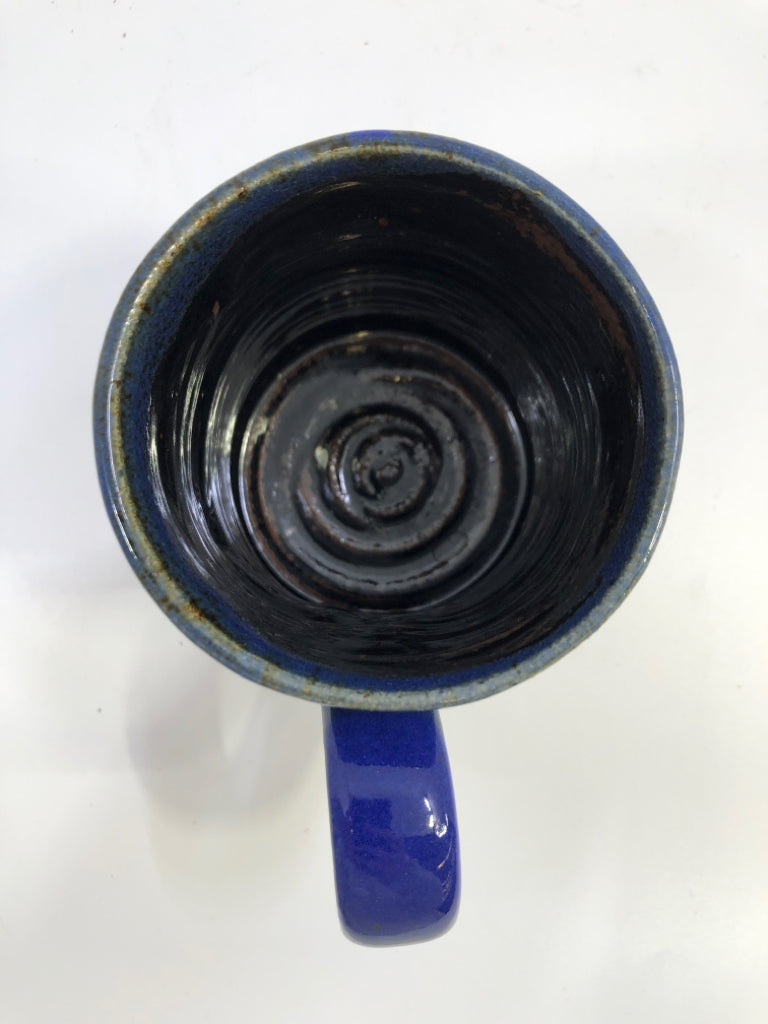 BLUE POTTERY MUG W/ BROWN&BLACK DESIGN.
