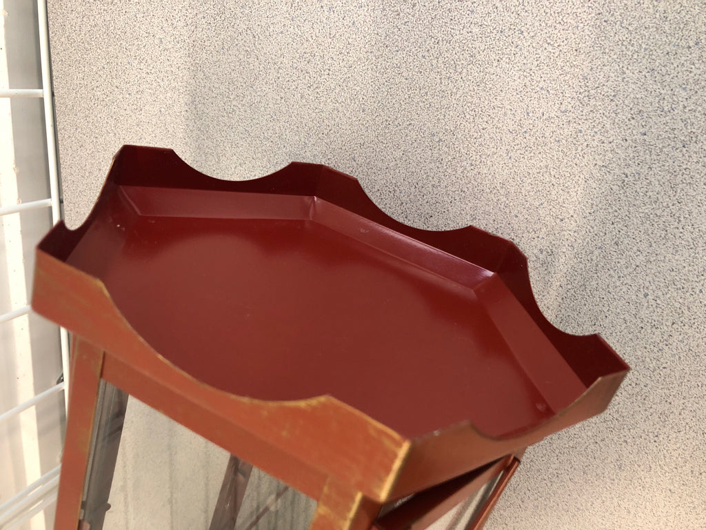 DISTRESSED RED CANDLE LANTERN.