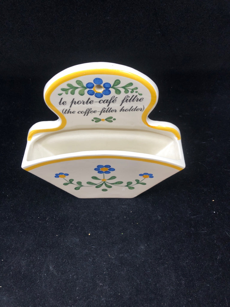 CERAMIC BLUE AND YELLOW COFFEE FILTER HOLDER.