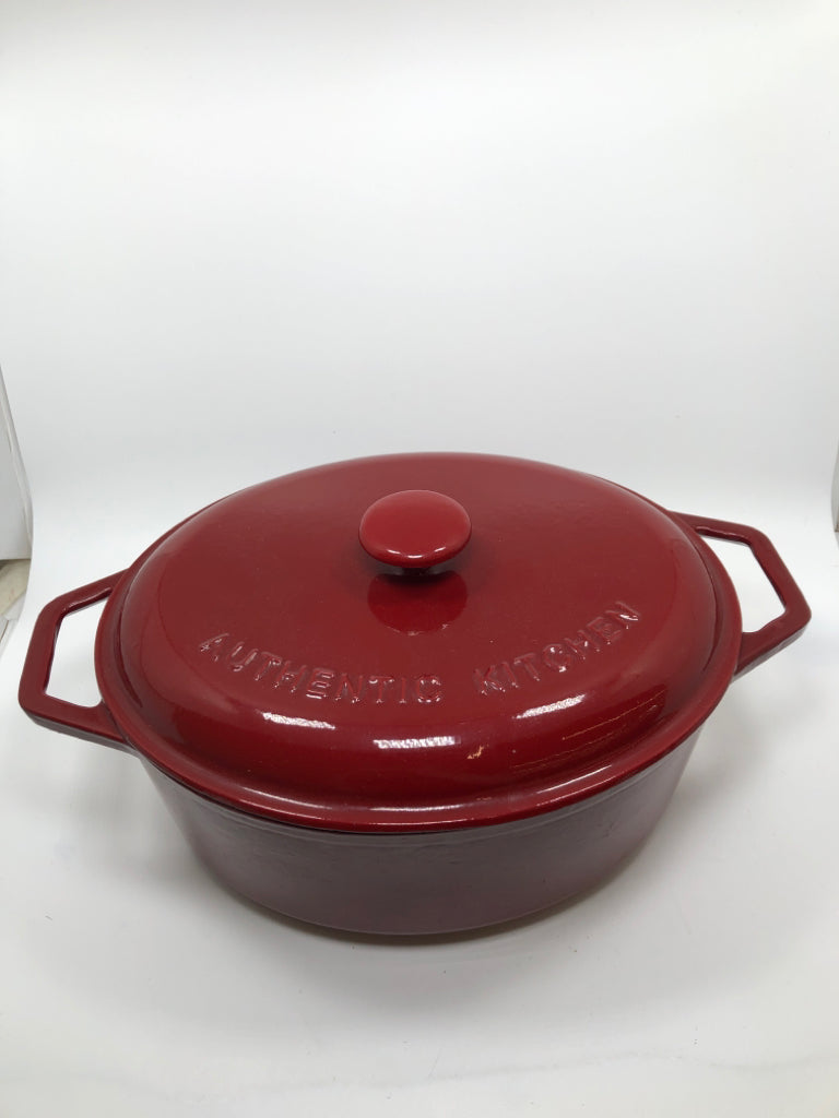 RED OVAL CAST IRON DUTCH OVEN.