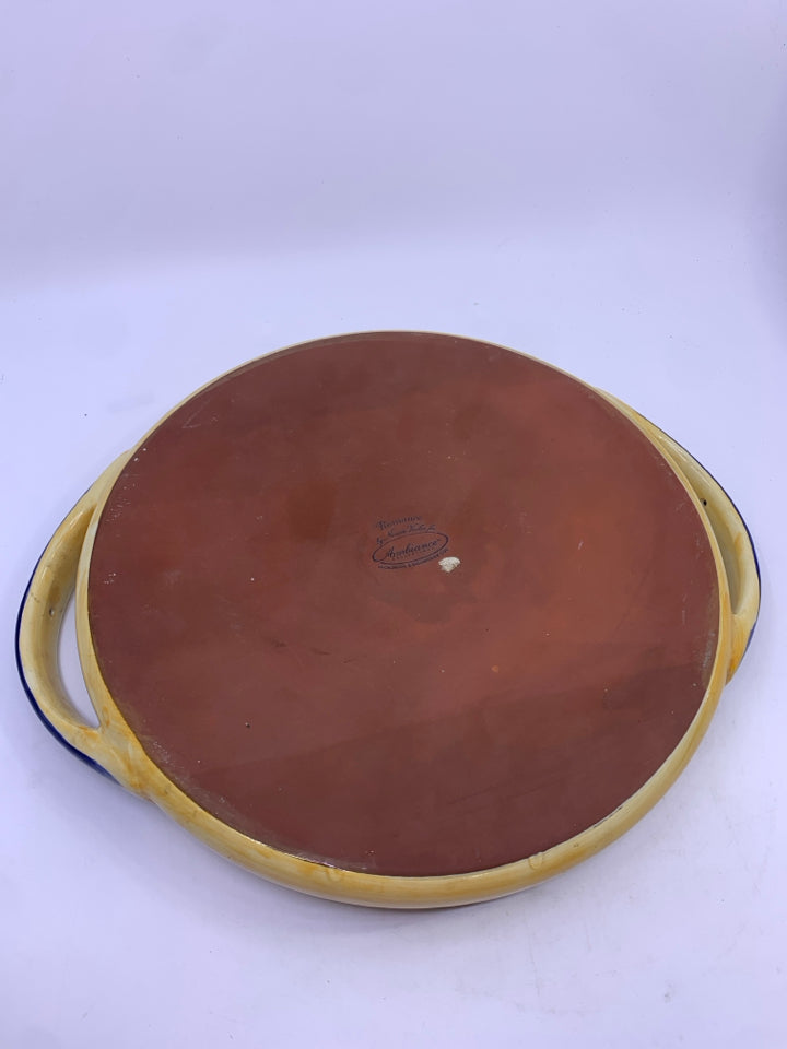 BROWN AND BLUE POTTERY DISH W HANDLES.