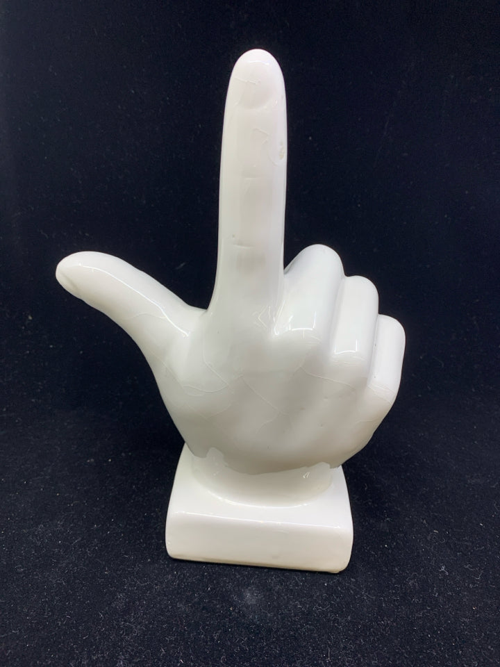 WHITE L SHAPED HAND FIGURE.