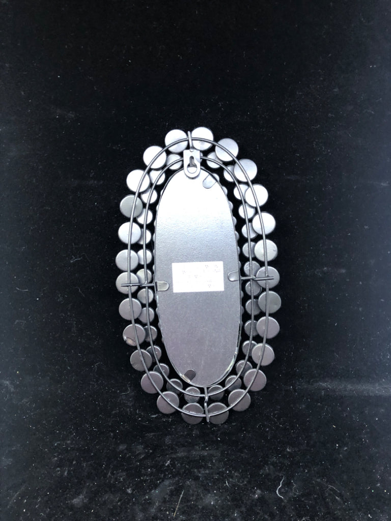 OVAL MIRRORED BEJEWLED WALL SCONCE.