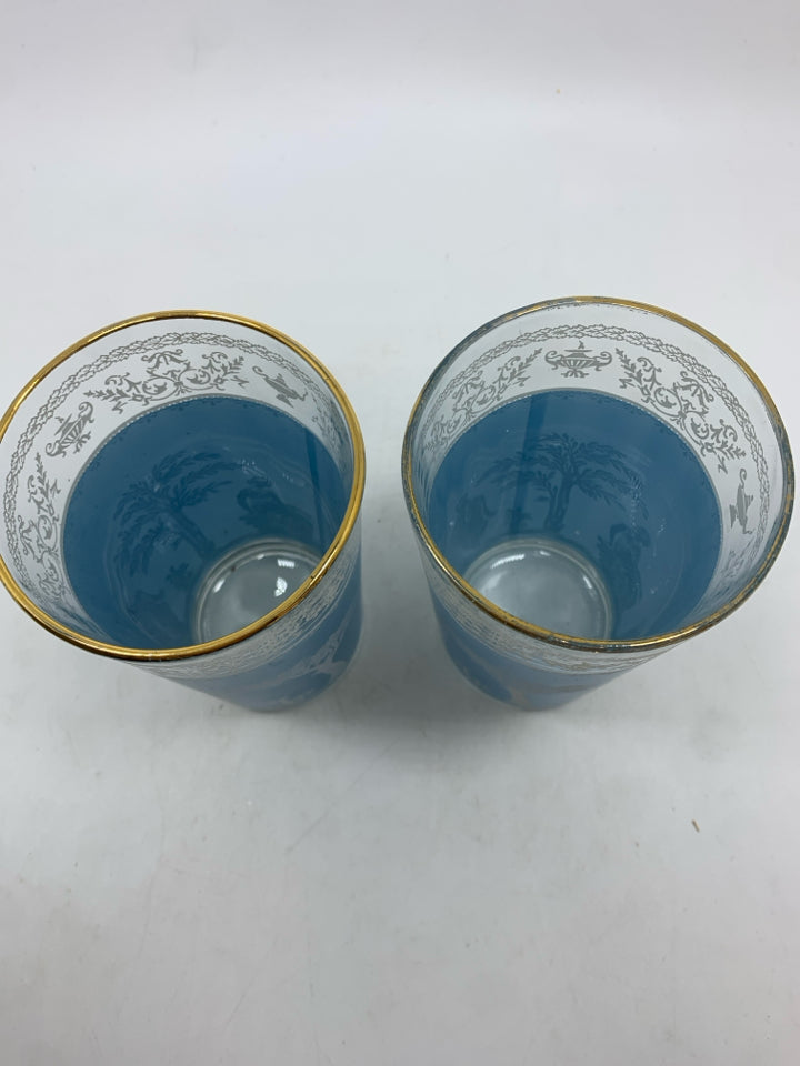 2 VTG BLUE FROSTED GLASSES W/GREEK SCENE AND GOLD RIM.