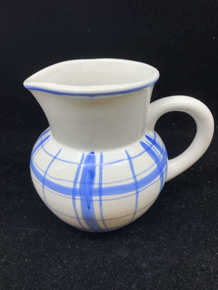 SMALL BLUE AND WHITE PITCHER.
