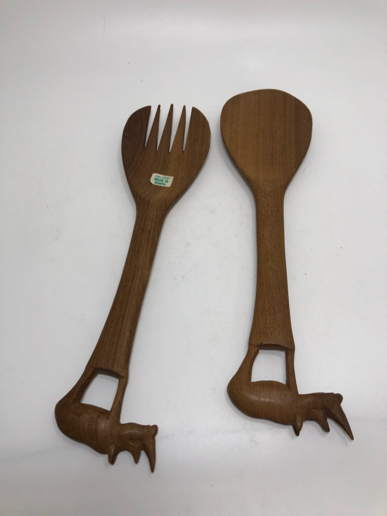 WOODEN SALAD SERVERS W/ RHINOCEROS ON HANDLE.