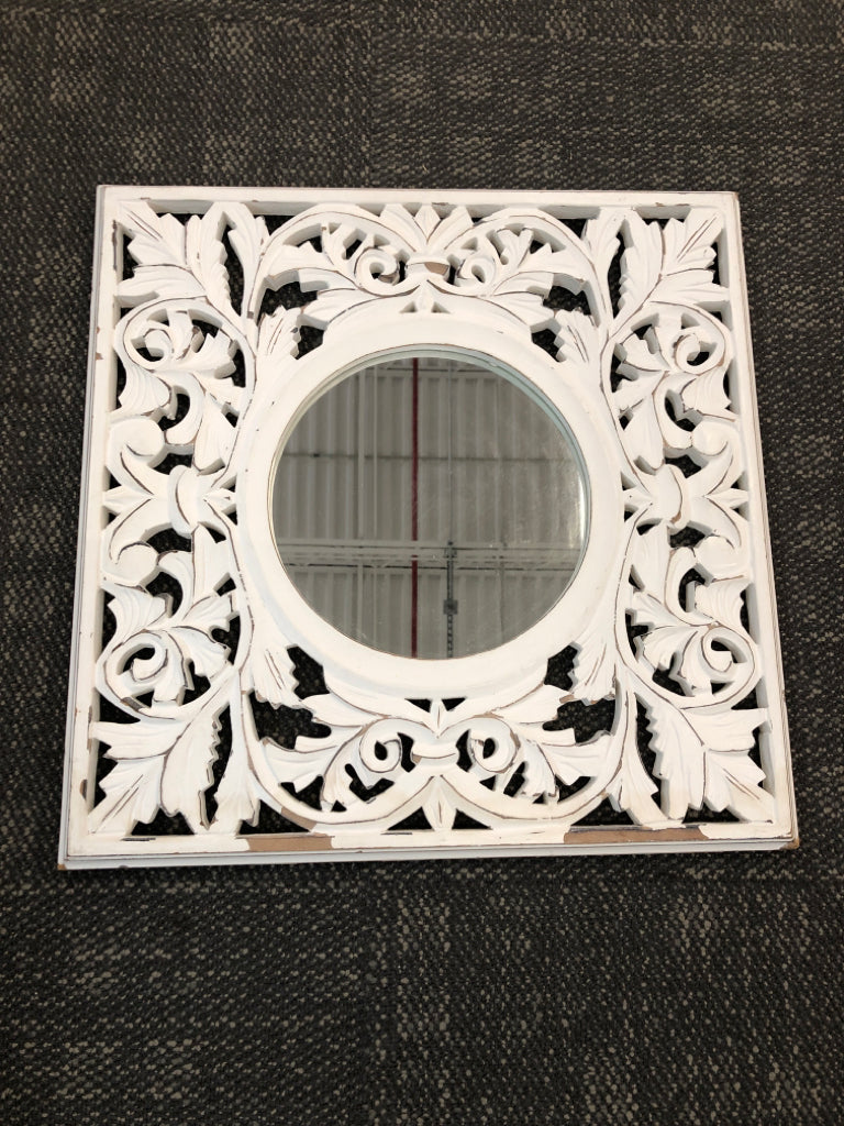 DISTRESSED WHITE CARVED MIRROR.