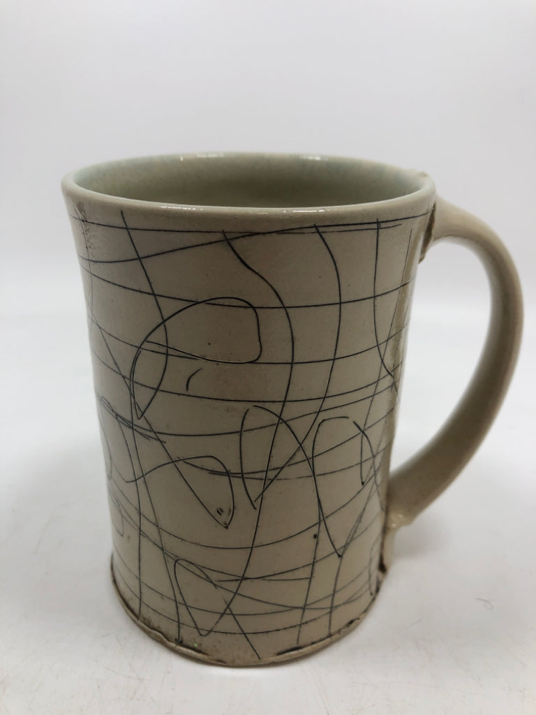ARTISTS SCRIBBLE CERAMIC MUG.