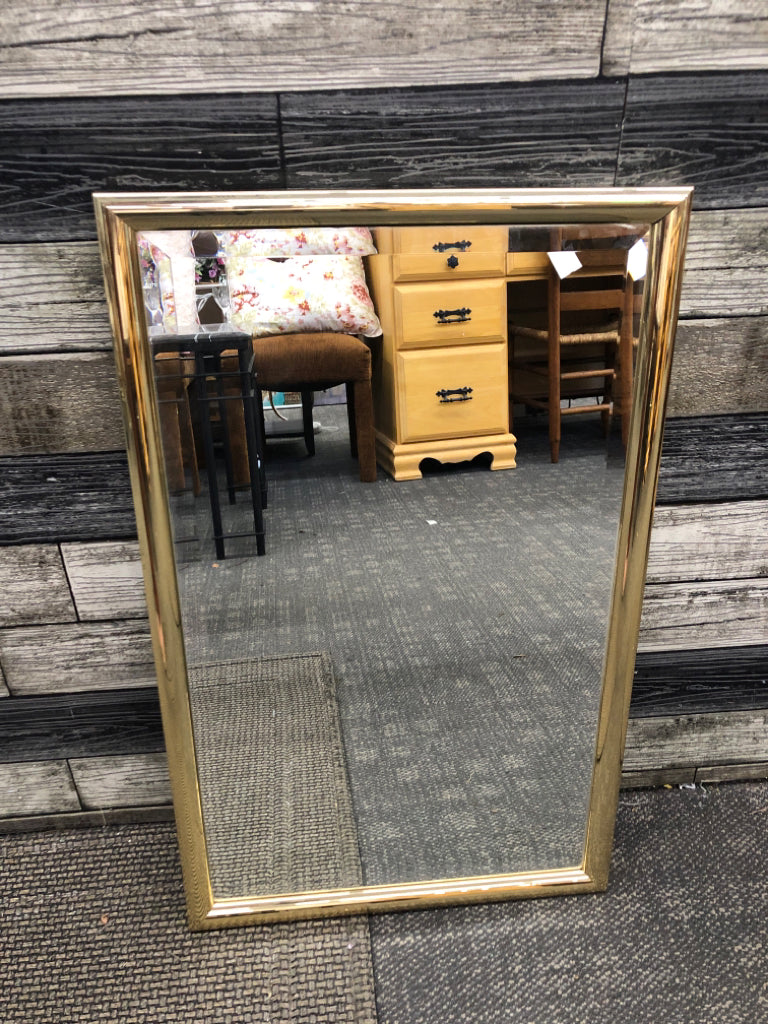GOLD FRAMED WALL MIRROR.