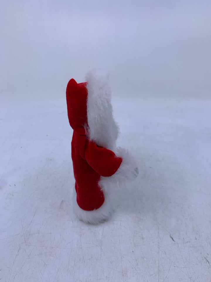 KID HOLDING CHRISTMAS TREE BYERS' CHOICE 1992.