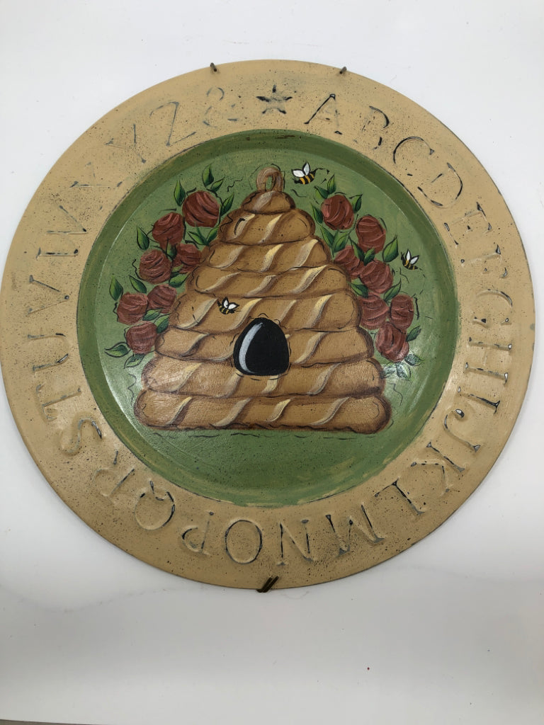 BEE HIVE PAINTED WALL PLAQUE.