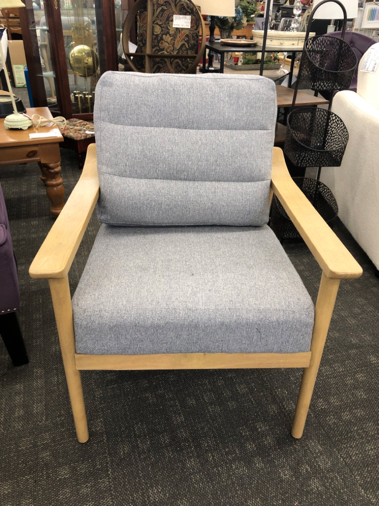 TAN CHAIR W/ GREY CUSHION.