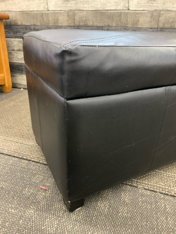FAUX BLACK LEATHER BENCH W/ FLIP TOP STORAGE.