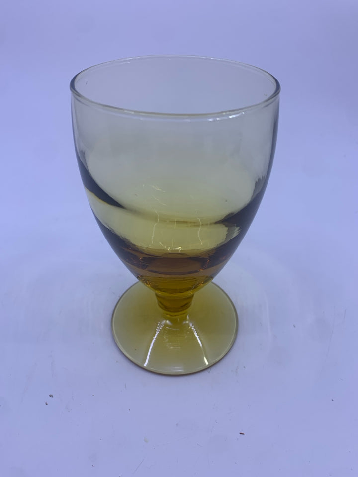 4 AMBER GLASS FOOTED GOBLETS.