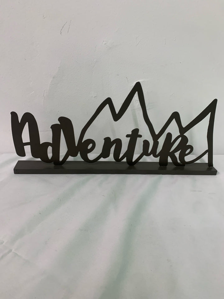 BROWN METAL STANDING ADVENTURE SIGN.