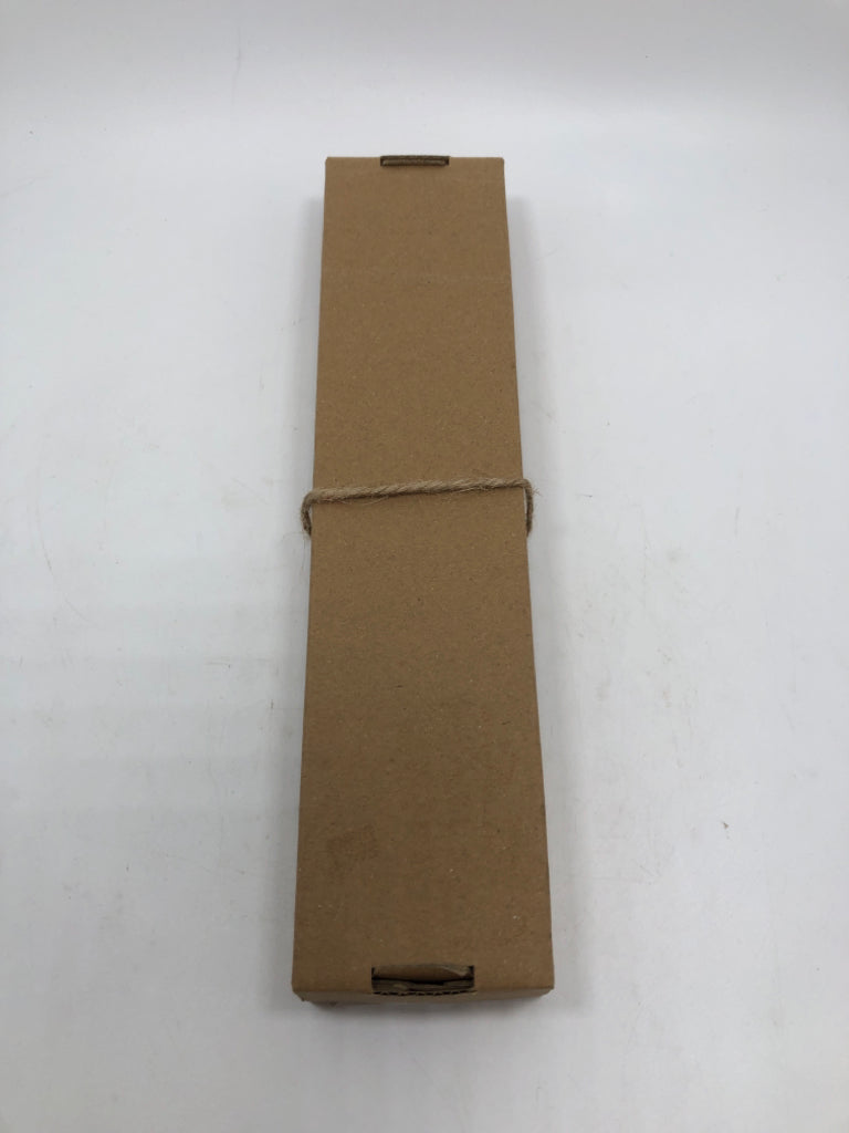 NIP 2PC CREAM TAPER CANDLES.