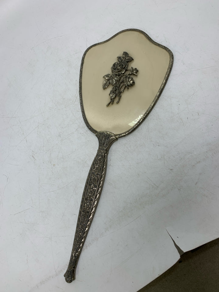 VTG SILVER PLATED HAND HELD MIRROR W/ EMBOSSED ROSE ON BACK.