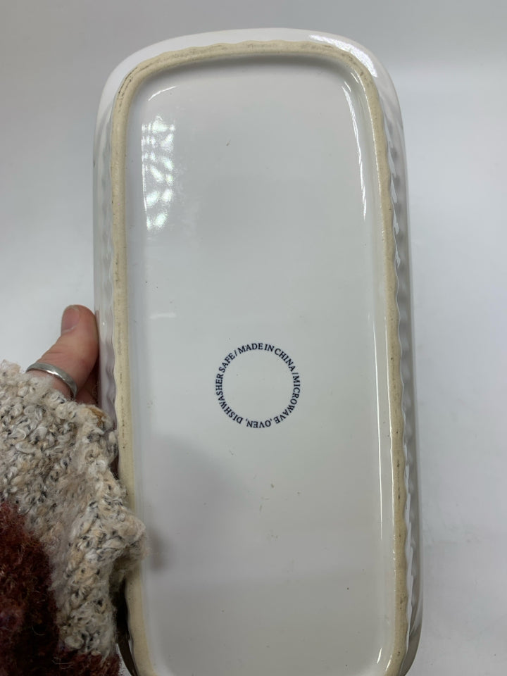 WHITE RIBBED NARROW LOAF PAN.