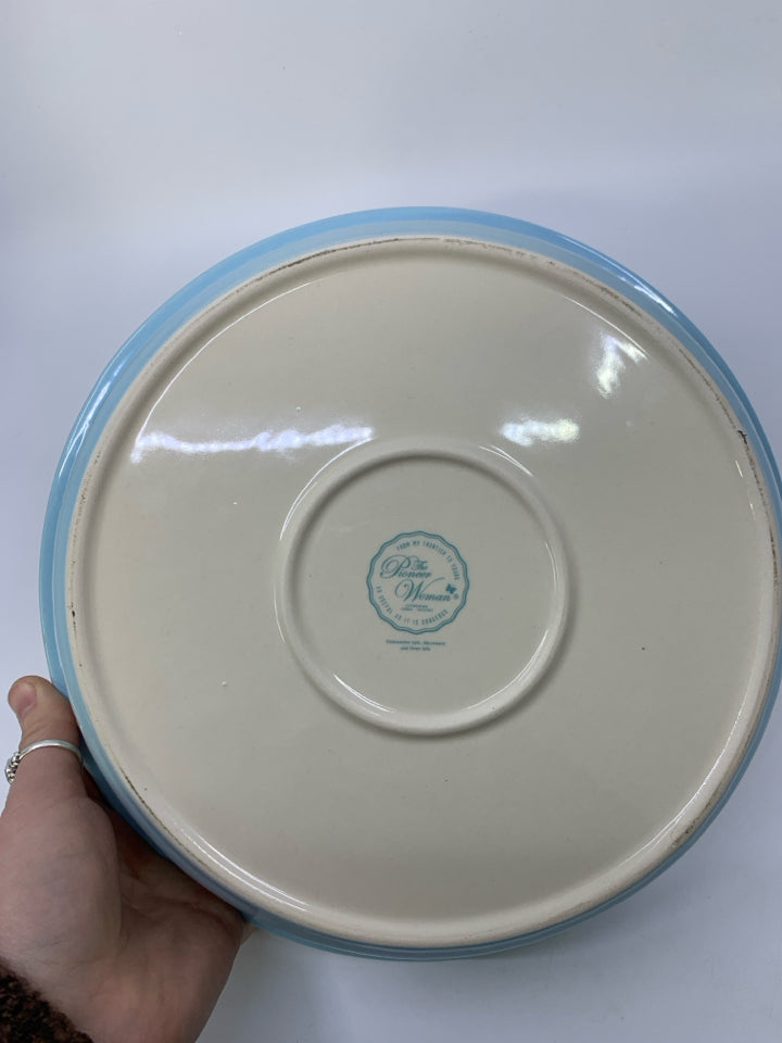 FLORAL BOUQUET IN CENTER W/ LIGHT BLUE BEADED EGE PIE DISH.