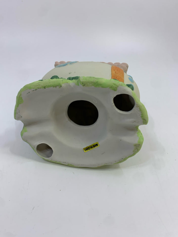 EGG SCHOOL FIGURINE.