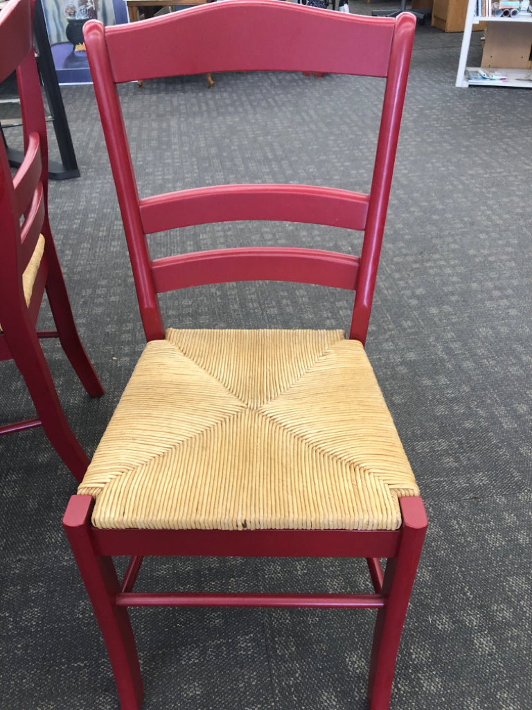 BLACK CONTEMPORARY TABLE & 4 RED CHAIRS W/WICKER SEAT.