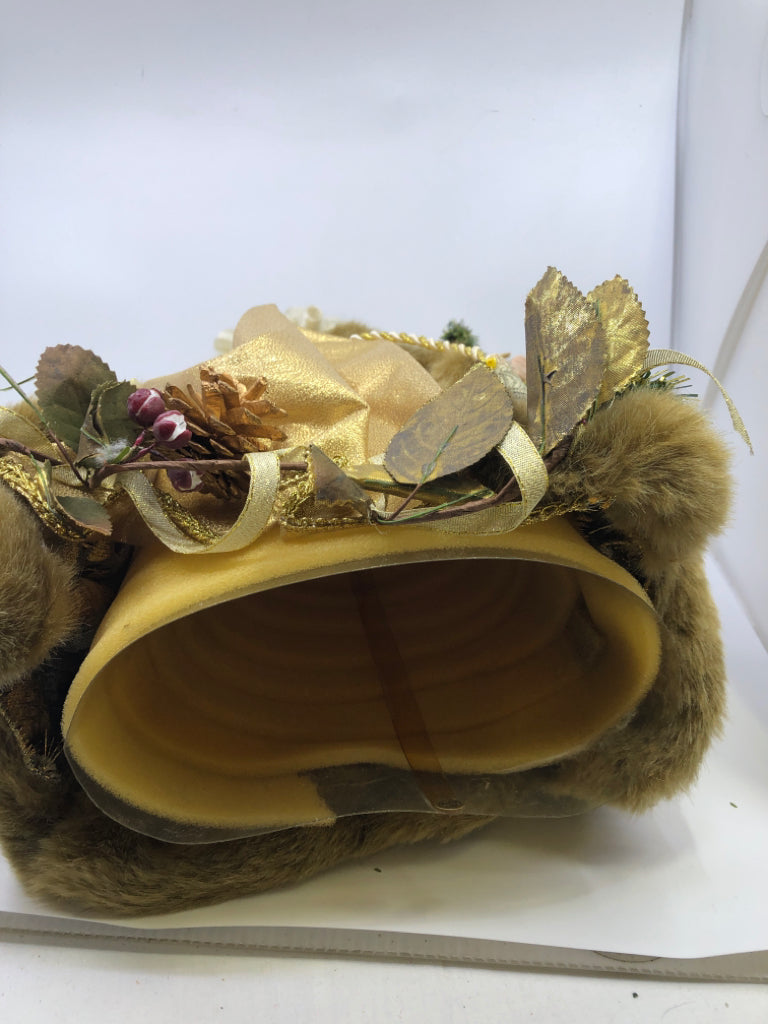 STANDING HOLLOW SANTA IN GOLD JACKET W/ PINECONES HOLDING STAKE.