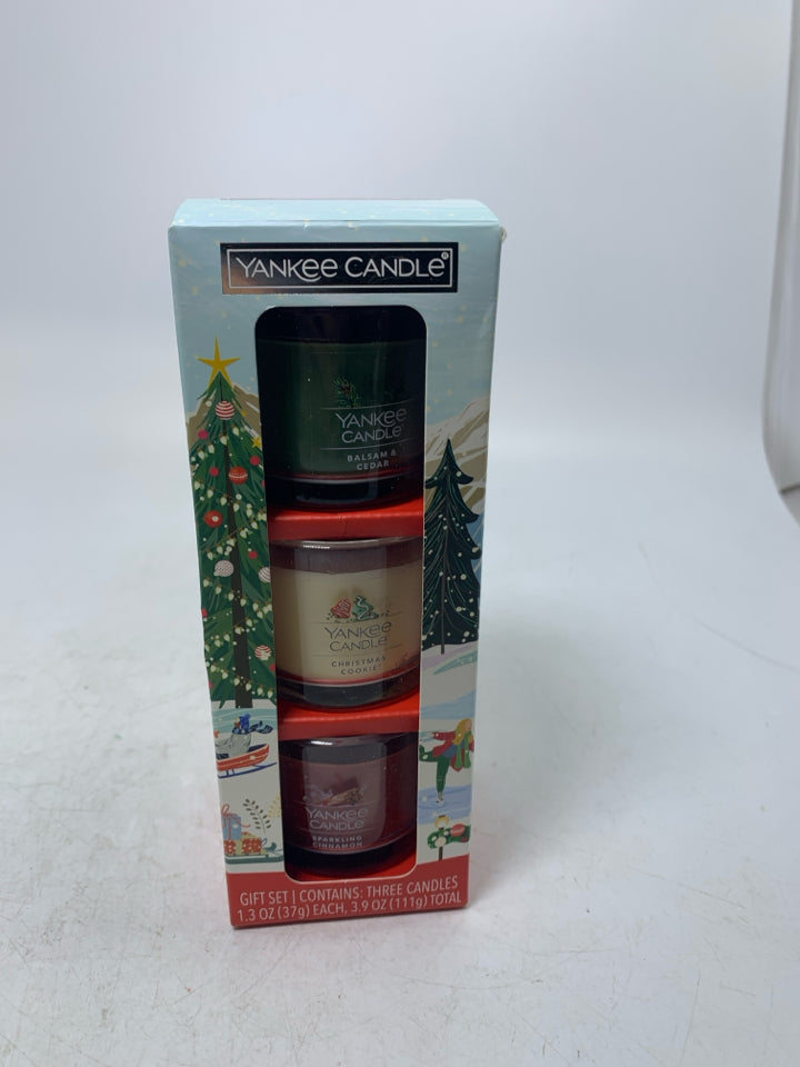 NIP 3 HOLIDAY SCENTED CANDLES.