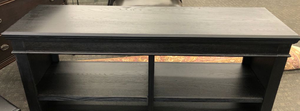 DARK WOOD TV CONSOLE W/2 SHELVES.