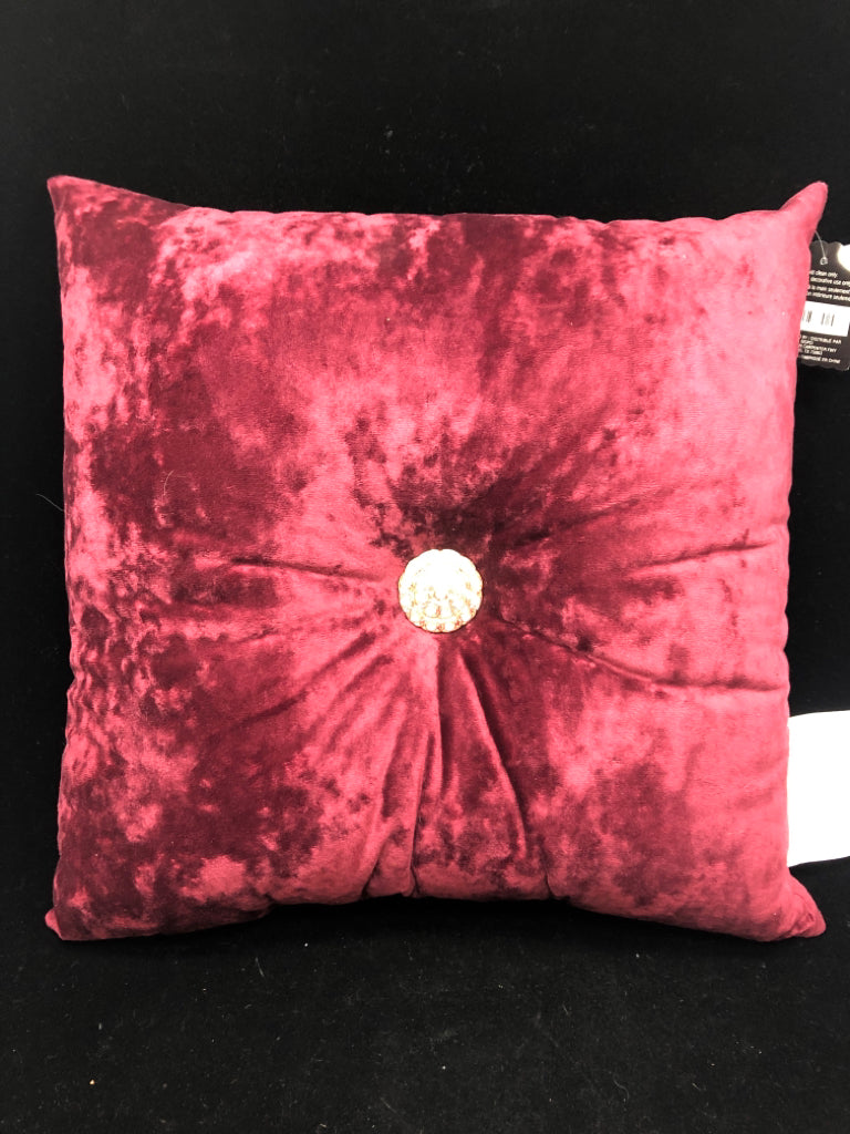 RED VELVET PILLOW W/GOLD+DIAMOND BUTTON.