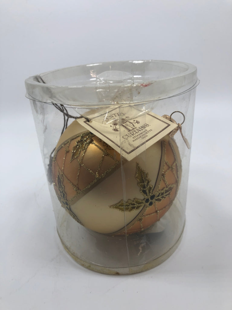 NWT GOLD GLITTER HOLLY PATTERN ORNAMENT.