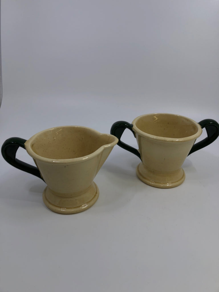 VTG farm AND MILK LADY SUGAR CREAMER SET TAN W/GREEN HANDLES.