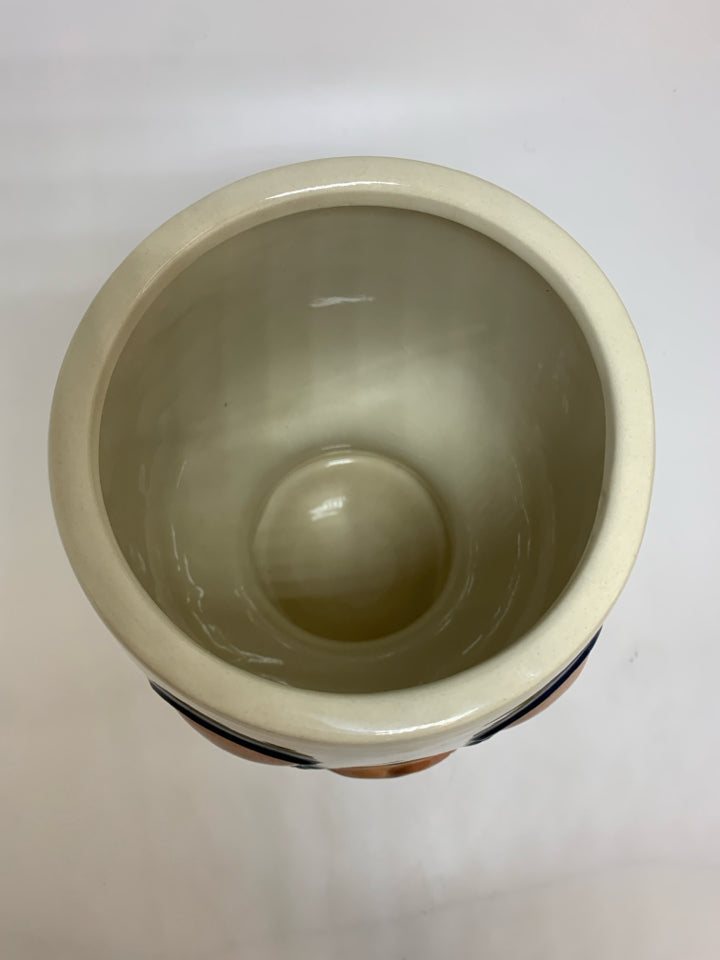 YELLOW DETAILED FACE PLANTER.