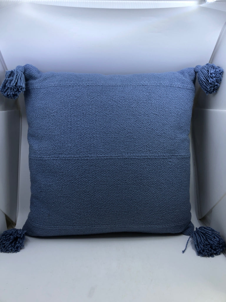 LT BLUE PILLOW W/TASSLES.