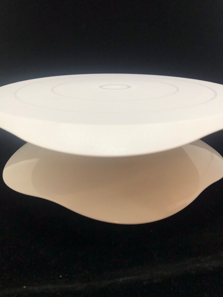 WHITE ROTATING CAKE-STAND.