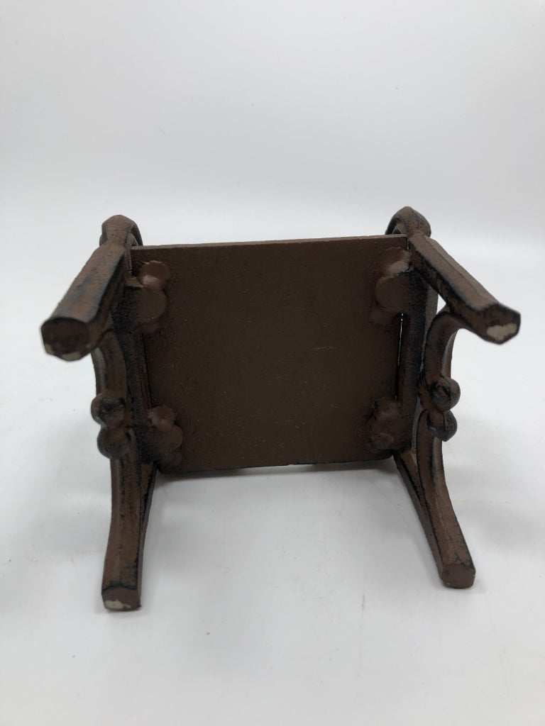 BROWN METAL CHAIR DECOR.